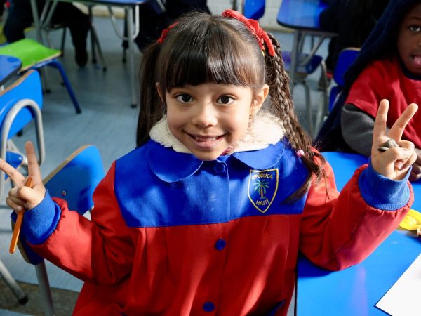 Niñas y niños de educación inicial en actividades de aula